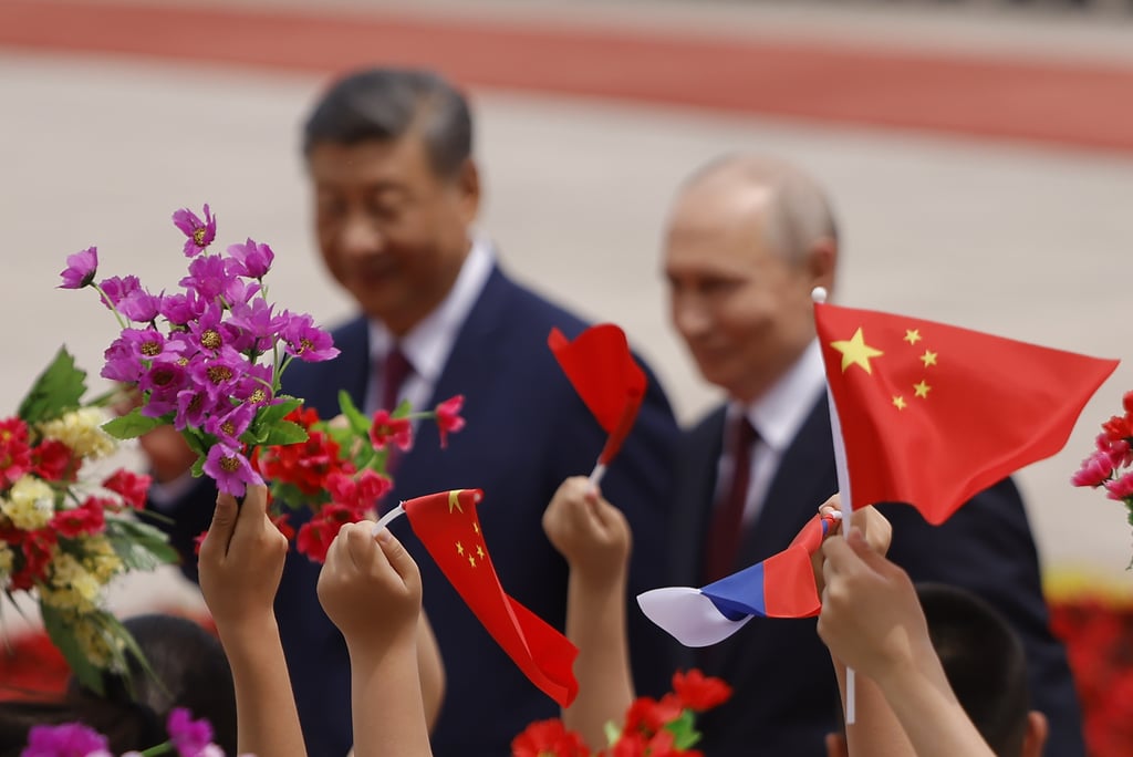 Putin, Following Trump, Visits the World’s Center Stage
