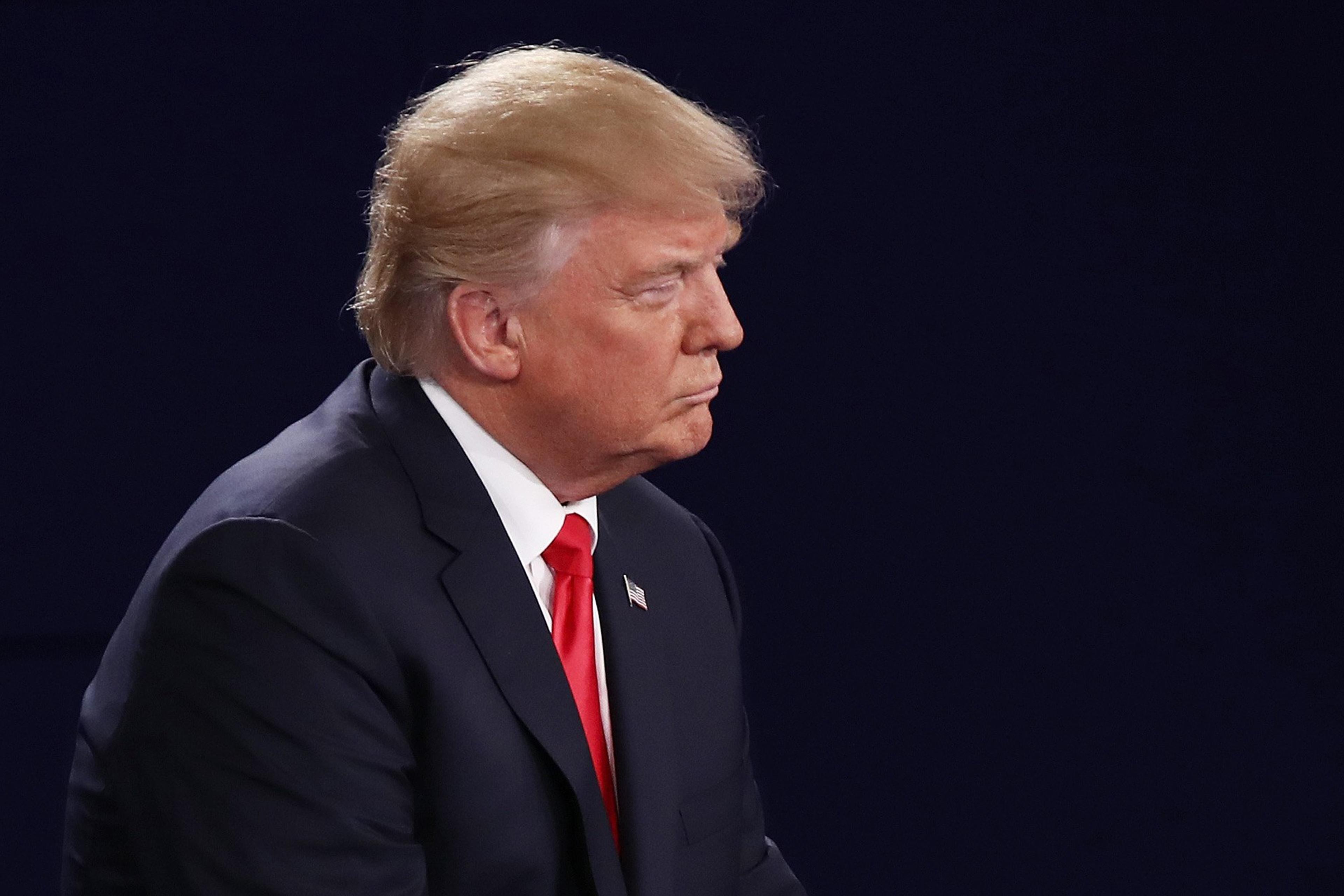 ST LOUIS, MO - OCTOBER 09: Republican presidential nominee Donald Trump sits on stage during the town hall debate at Washington University on October 9, 2016 in St Louis, Missouri. This is the second of three presidential debates scheduled prior to the N