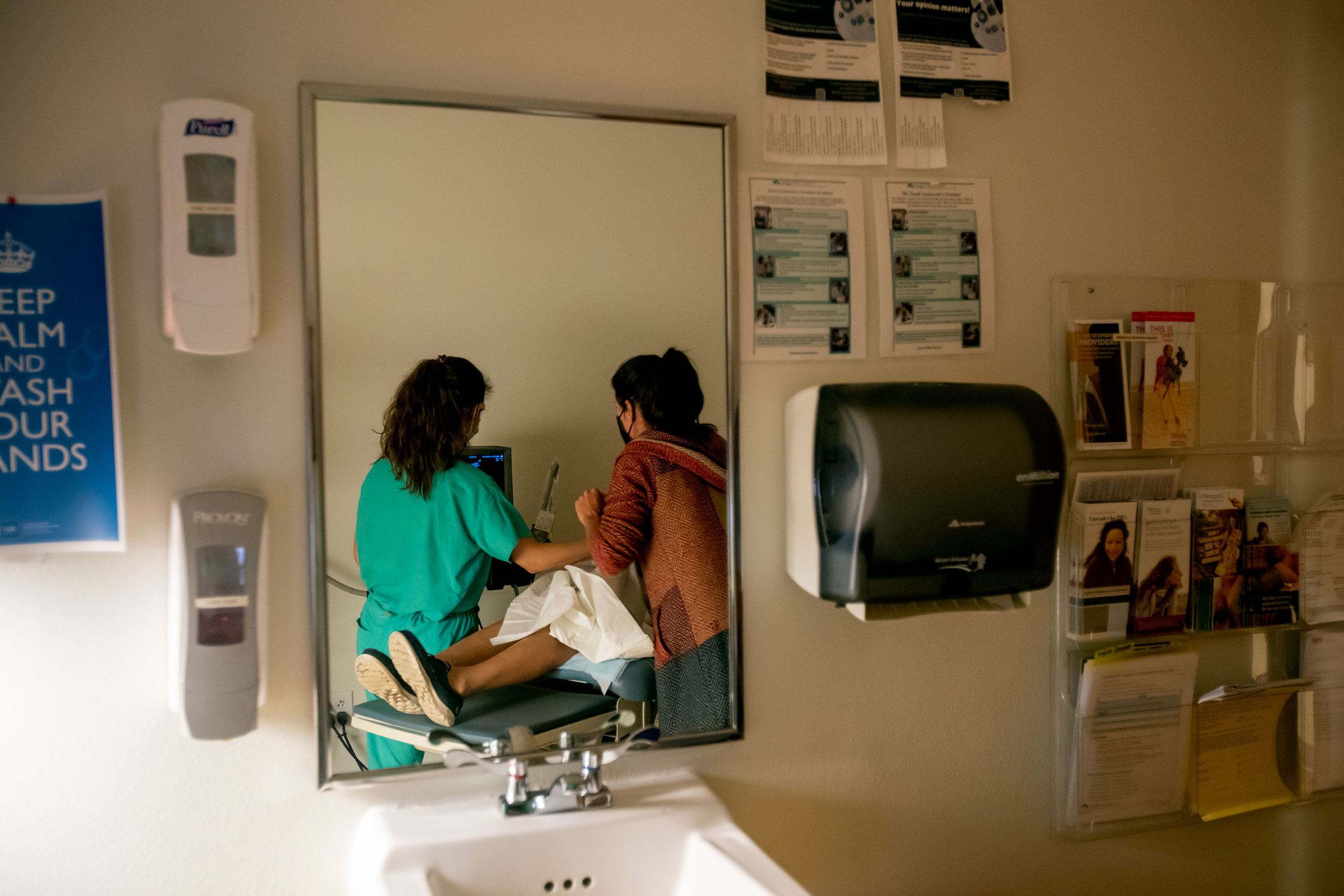 A family physician and her resident perform an ultrasound on a 39-year-old woman who already has four children the day before the Supreme Court overturned Roe v. Wade at the Center for Reproductive Health clinic in Albuquerque, New Mexico, on June 23, 20