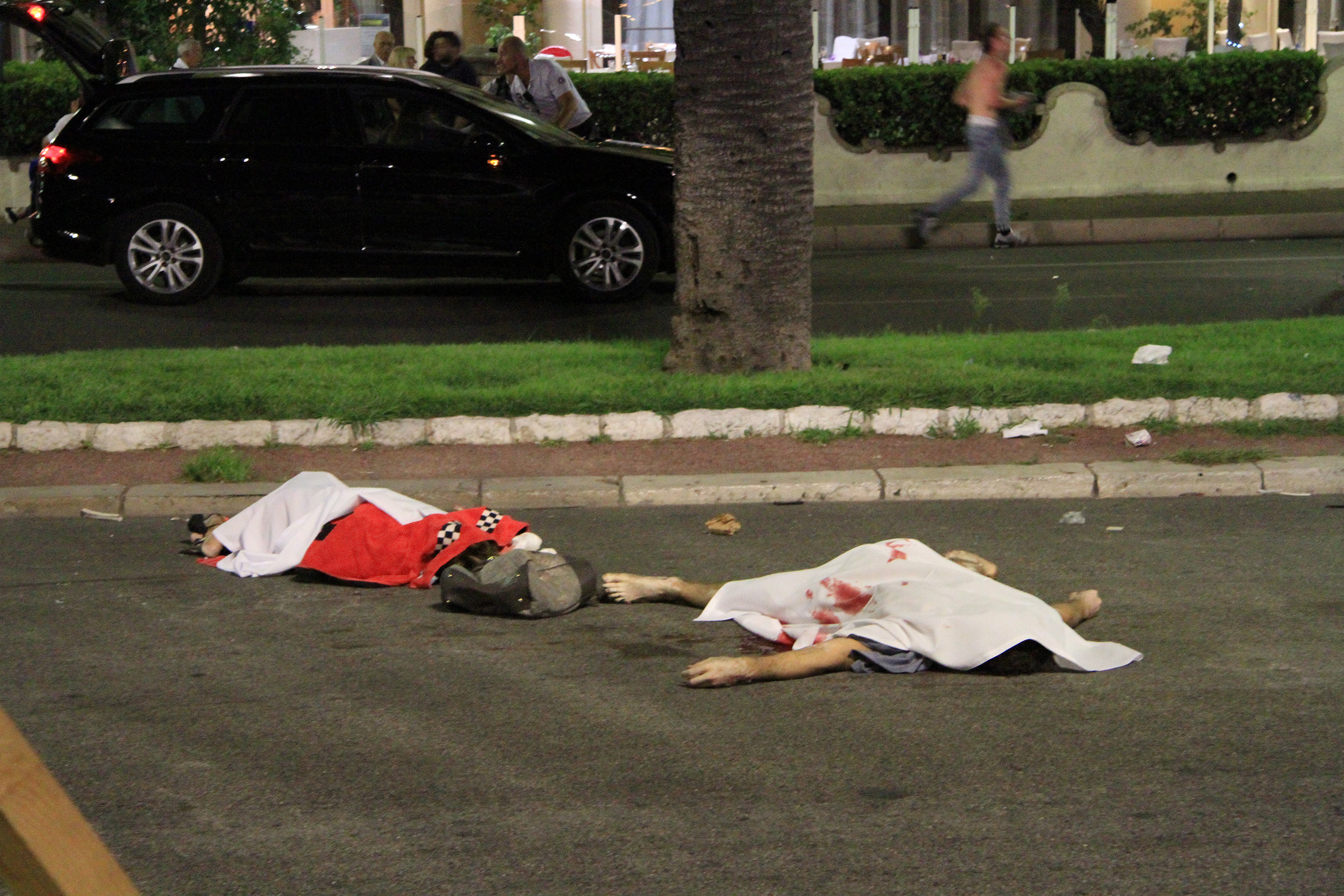 Bodies lie in the streets of Nice, France, after a terrorist attack left at least 77 dead and dozens injured on July 14, 2016.