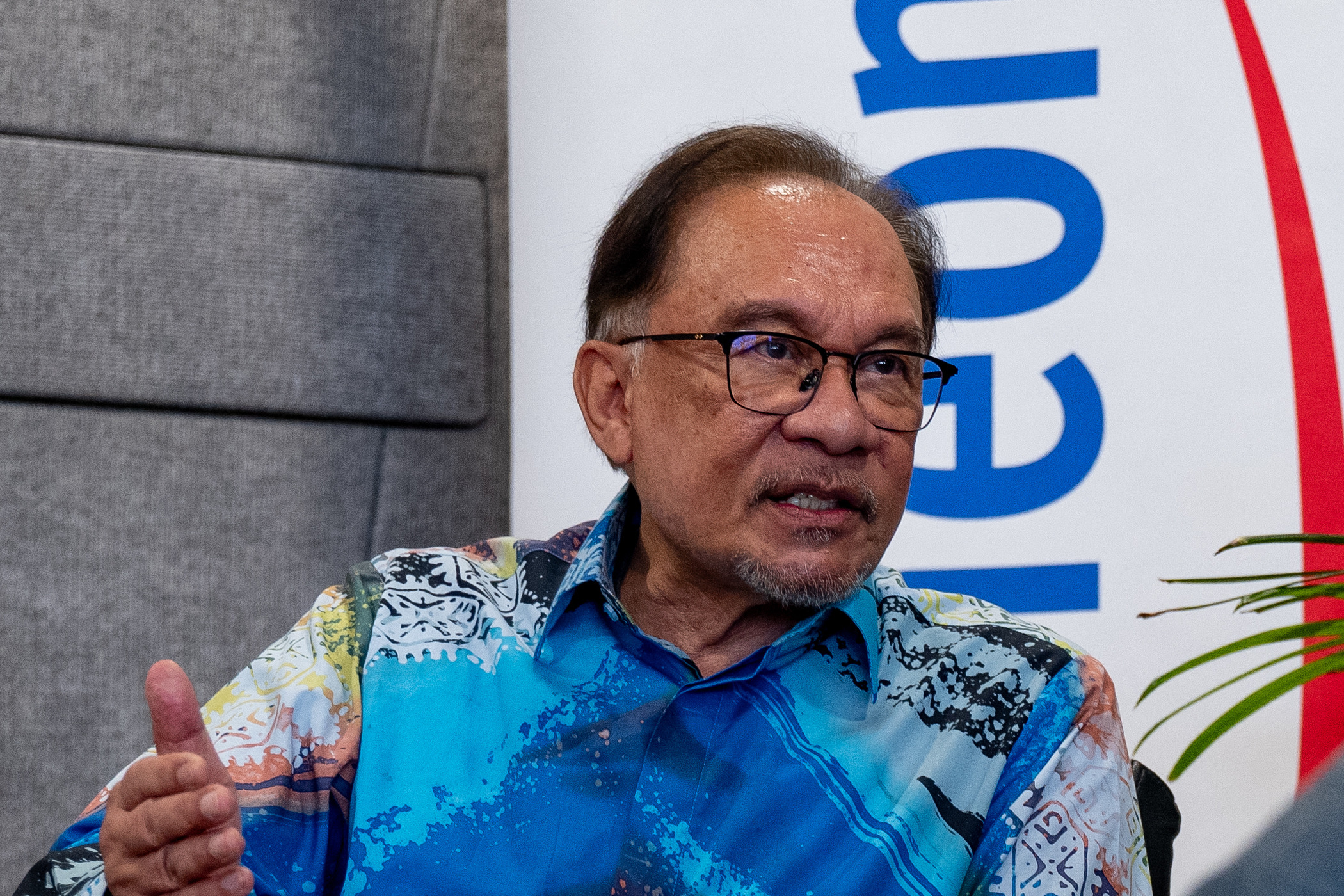 Prime Minister Anwar Ibrahim talks to TIME at the opening of an Infineon semiconductor fab in Kulim, Malaysia, Aug. 8, 2024.